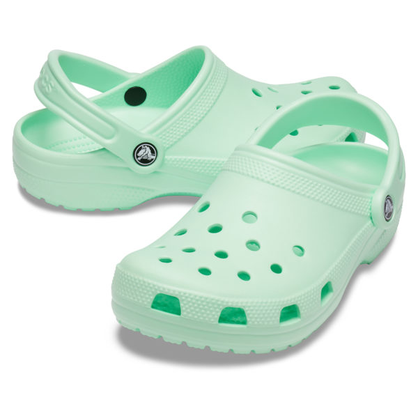 mint green crocs with fur